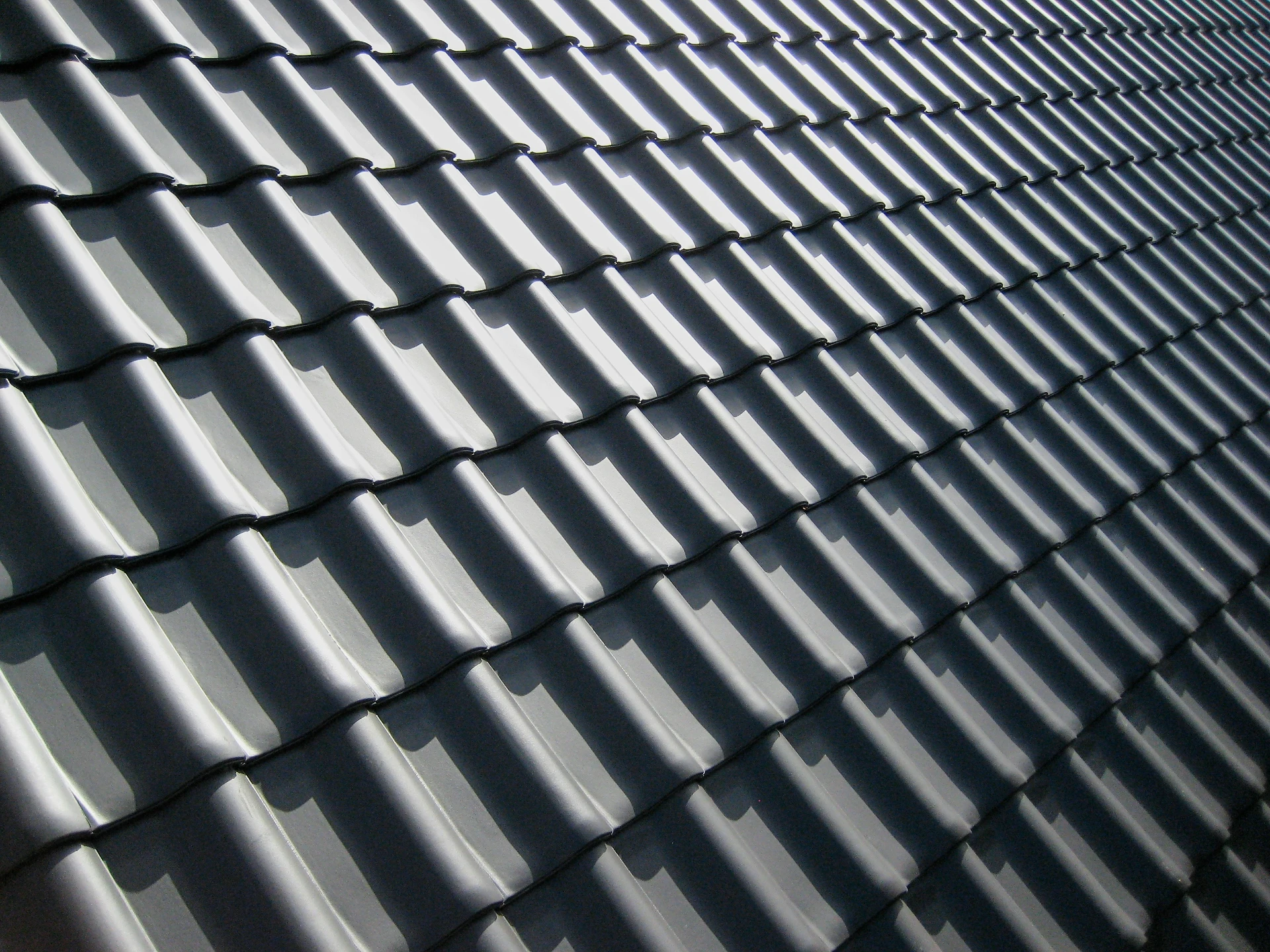 Residential house roof in a neighborhood